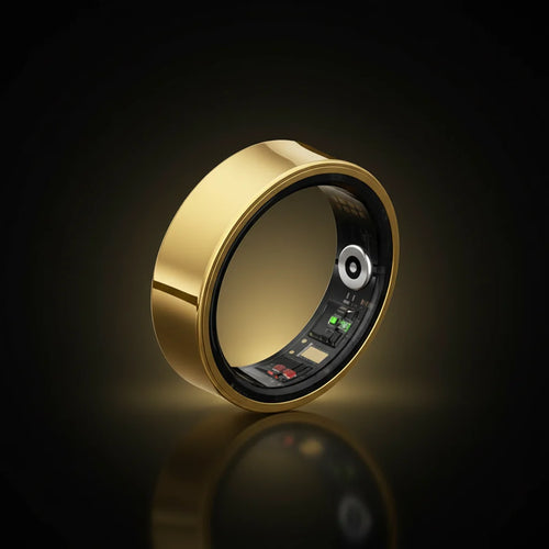 Gold ring with electronic components next to a black charging case on a white background